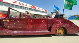 Chinese men use 3 tonnes of rosewood to create impressive vintage car