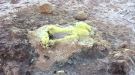 Huge crater of active volcano on Niciros Island. Greece.