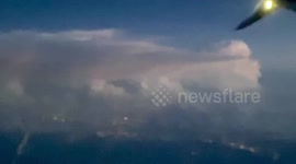 US airline passenger captures epic lightning storm from above