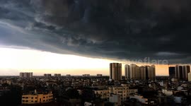 Ominous dark clouds cover form over Hanoi, Vietnam