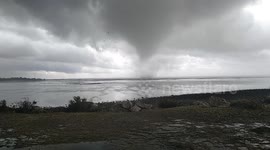 Incredible footage of French waterspout becoming destructive tornado and causing damage along the Atlantic coast
