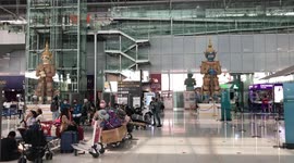 Stranded tourists rush to leave Thailand a day before police start 'mass arrests' over visas