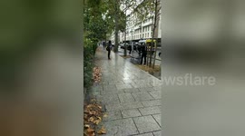 Gun-wielding police stop man during manhunt after knife attack in Paris