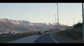Watch as winter hits Iceland early as commuters enjoy amazing views as they travel to work in Reykjavik