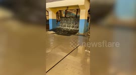 Giant ice cubes slide along ground at factory in Thailand