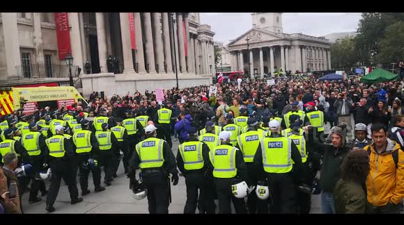 Scores of police move into Trafalgar Square to break up anti-lockdown