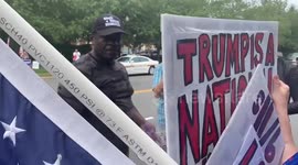 Tensions high as anti and pro-Trump supporters face off during president's visit to golf course in Virginia