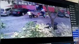 Chinese cleaner risks life by dragging burning scooter away from vehicle