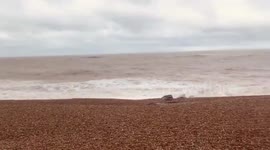 Watch as Storm Alex strikes the English Channel coast at Hastings, UK with large waves and severe wind gusts