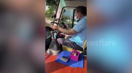 Bus driver seen scrolling through Facebook while at the wheel on Thai highway