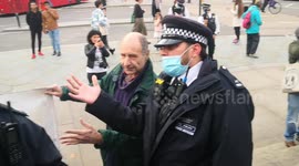 Police descend on picadilly circus for Julian Assange protesters