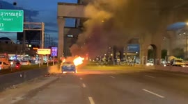 Taxi bursts into flames as passengers flee in Thailand