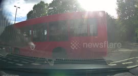 Driving instructor almost runs pedestrians over on a crossing