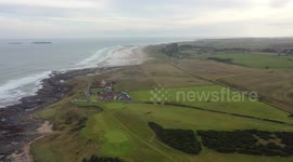 Beach walkers stunned when they stumble across giant artwork of a SKIER etched into the sand