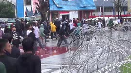 Indonesian police clash with students as thousands protest against government's jobs law