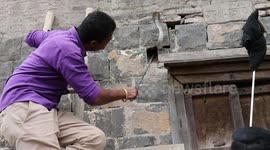 Terrified family discover cobra living inside their walls in western India