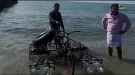 School dropouts in India build 'sea cycle' to prevent residents from drowning