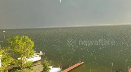 Barrage of huge hailstones create bizarre scene on Canadian lake