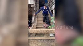 Cambodian man finally receives treatment after living with swollen leg for two decades