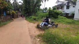 Watch - Young boy designs a car is his backyard using his father old bike motore gine