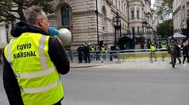 London's most famous Megaphone man, Danny Shine roasts police for 'wearing face masks, and 'stealing peoples cannabis'.