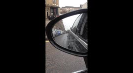 Man skiis through the streets of Edinburgh