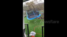 Trampoline blown away by strong winds as storm sweeps through British Columbia, Canada