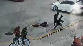 Manhole explosion sends Chinese boy flying into air after he throws firecracker inside