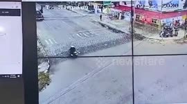 Motorcyclist crashes into razor wire set up by police during Indonesia protests