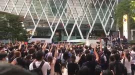Thai protesters hold three-finger salute during rally in Bangkok