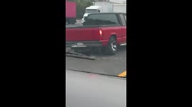 Truck on Los Angeles freeway loses wheel and tire, grinds to a stop