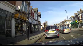 Lady turning right at lights and not giving way