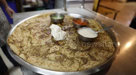 Indian shop owner claims their Paratha is the biggest in Bangalore in southern India