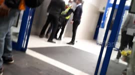 Tomatoes splatter the ground as Lidl security grab suspected shoplifter