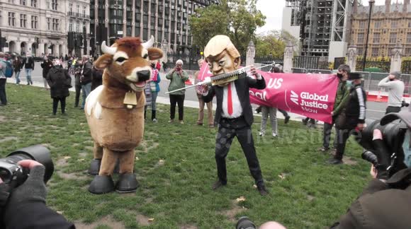 Dozens gather in Westminster to protest against UK-US trade deal