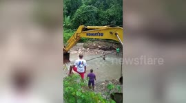 Boy, 5, operates excavator in Indonesia