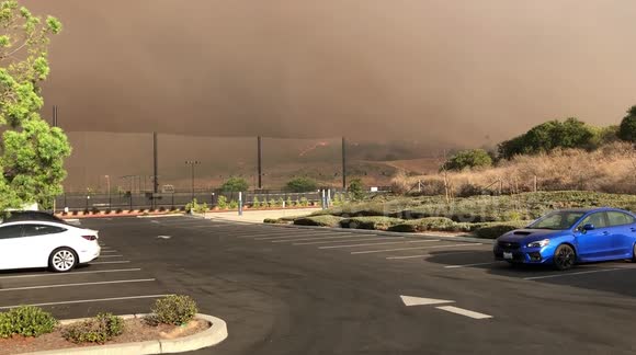 Smoke fills the air as Silverado Fire doubles in size