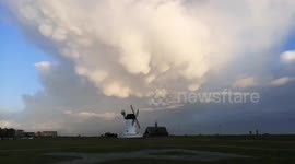 Watch as stunning mammatus clouds hang threateningly over a windmill in Lytham, UK