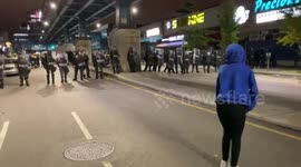 BLM protester dances in front of riot police before they charge at crowds