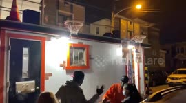 Trailer with basketball nets attached drives through Philadelphia protests