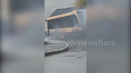 This is the moment a bus burst into flames just moments after the driver noticed smoke