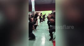 Factory staff in China kneel down to slap themselves in weird training exercise