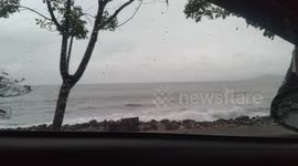 seeing the sea charm from behind the car window