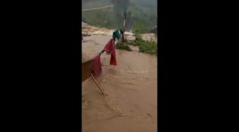 Floodwater races down mountains after Typhoon Molave hits Vietnamese mainland