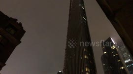 Emergency crews respond after large debris fall from spinning crane in Manhattan