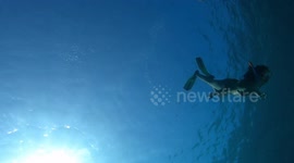 Two bubble rings making art