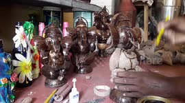 Carver makes exotic sculpture out of coconut shells in east India