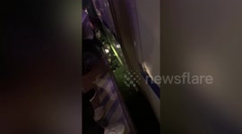 Station staff rescue child trapped between platform and train in southern China