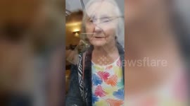 Heartbreaking moment care home resident breaks down in tears after being told daughter can't come inside for a hug