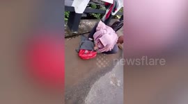 Abandoned newborn baby found on bride in Indonesia